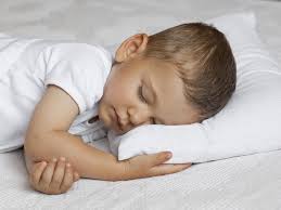 child with pillow