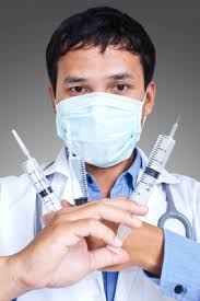 doctor with needles